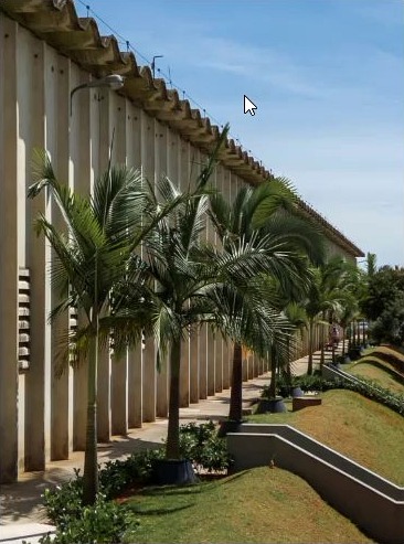 Área externa da ID Móveis com paisagismo
